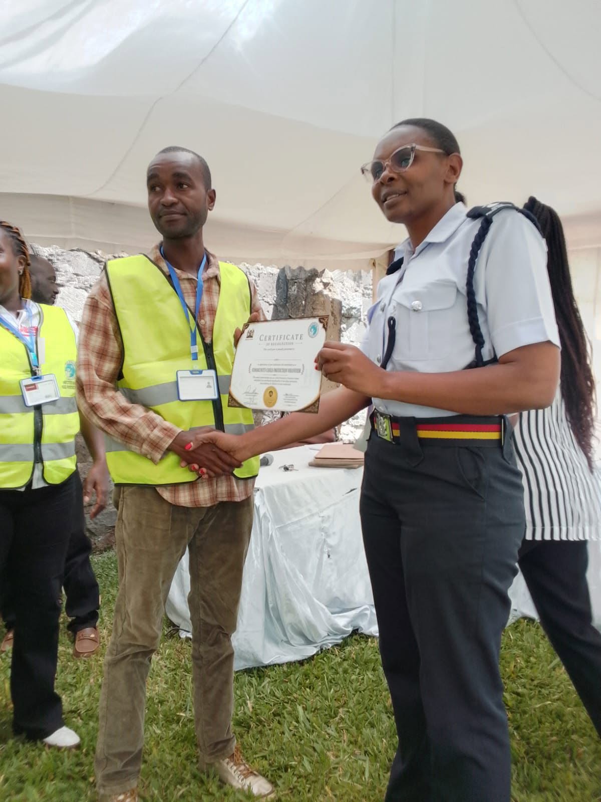 Team receiving Child Protector Ambassador certificates
